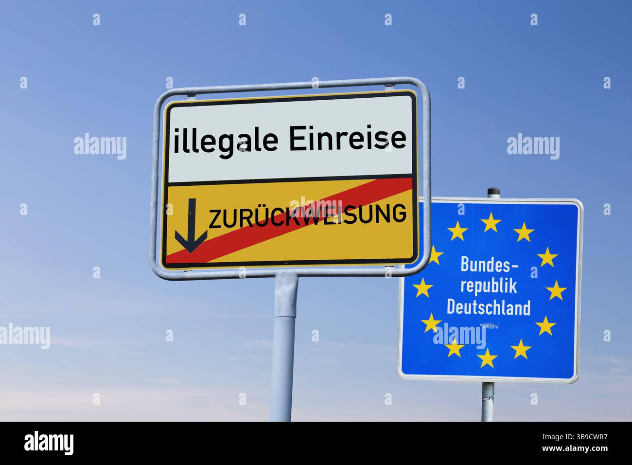 Fotomontage Ortsausgangsschild mit der Aufschrift ILLEGALE EINREISE / ZURÜCKWEISUNG vor einem Grenzschild der Bundesrepublik Deutschland *** fotomontazione di un cartello di uscita della città con l'iscrizione "ILLEGITTIMO INGRESSO" di fronte ad un cartello di frontiera della Repubblica federale di Germania Copyright: XUdoxHerrmannx Foto Stock