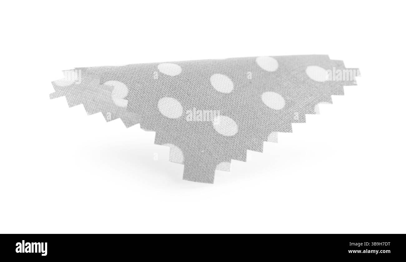 Campione di tessuto grigio con pois di polka isolato su bianco Foto Stock
