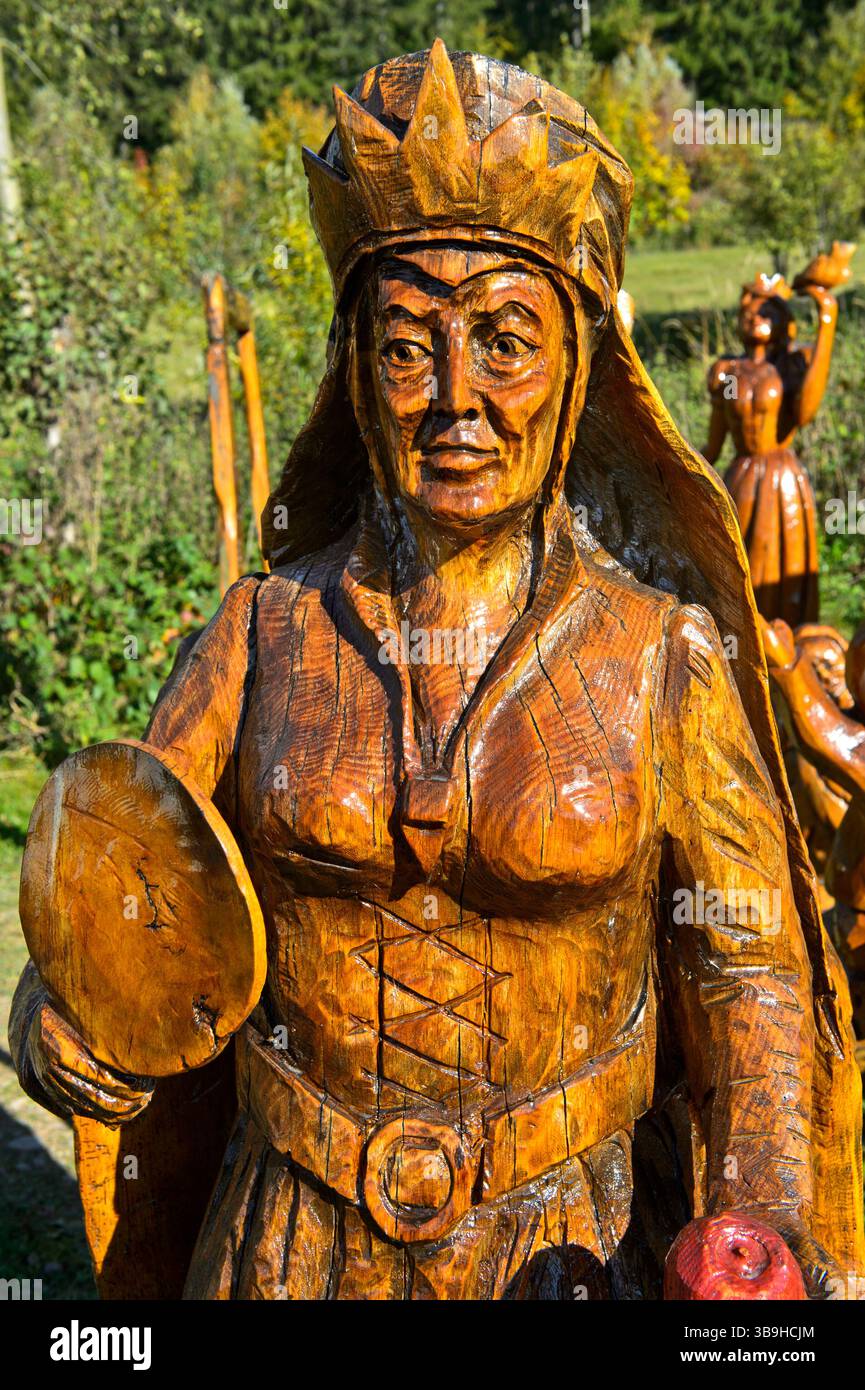 Scultura in legno, arte delle motoseghe nel museo all'aperto per le sculture in legno di Blockhausen vicino a Dorfchemnitz, Sassonia, Germania Foto Stock