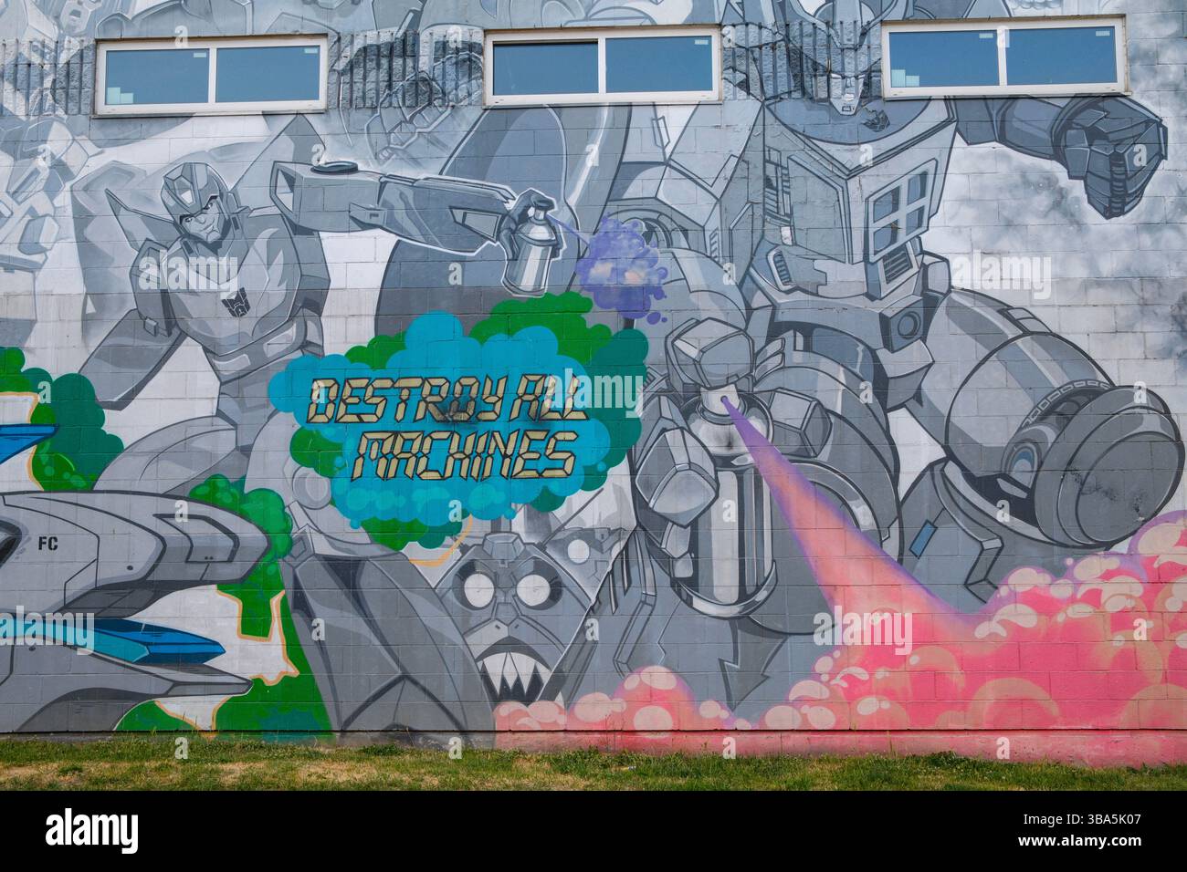 Un murale a tema Space Transformer degli anni '1980 a East Vancouver, BC. Foto Stock