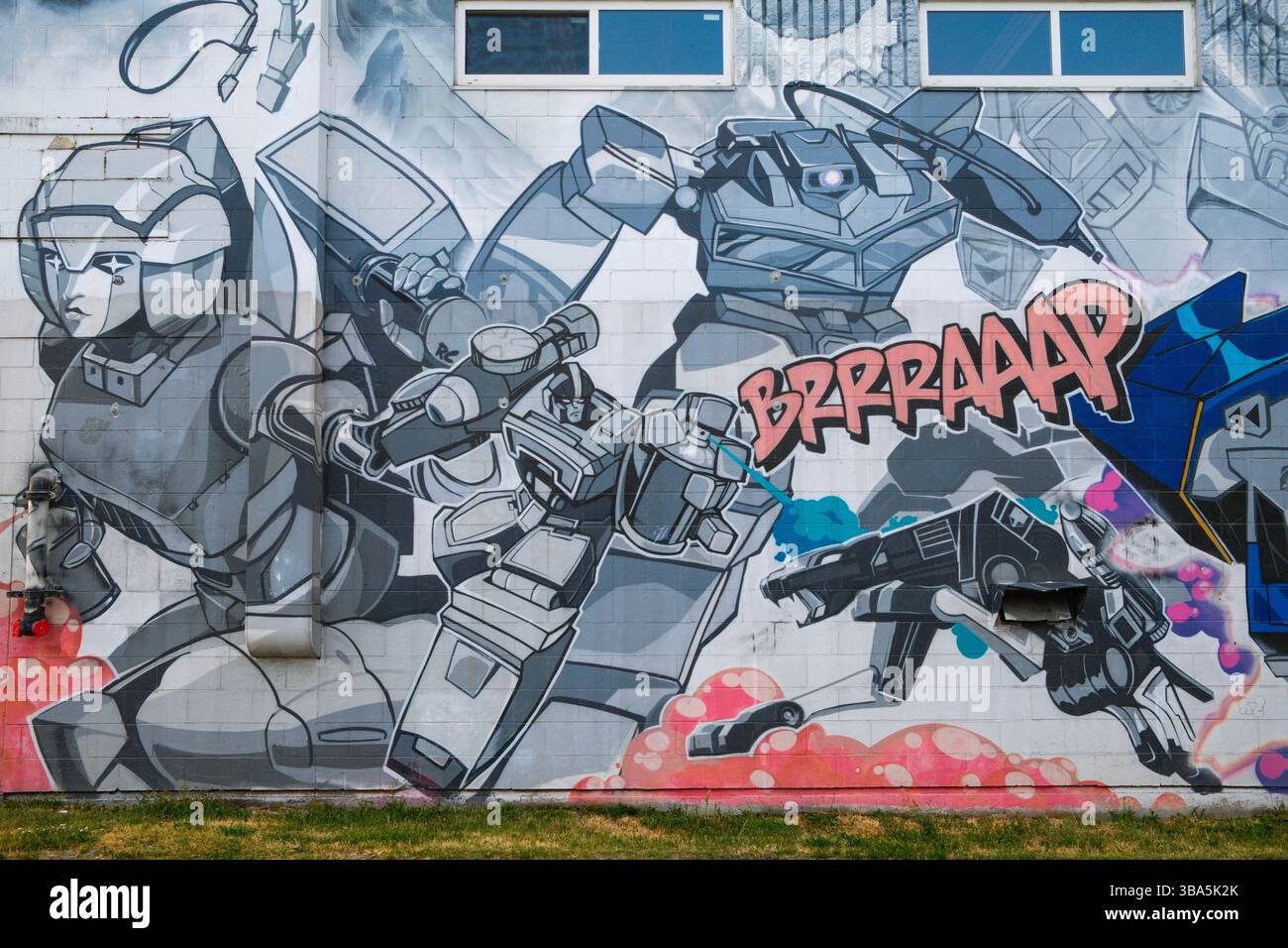 Un murale a tema Space Transformer degli anni '80 a East Vancouver, BC. Foto Stock