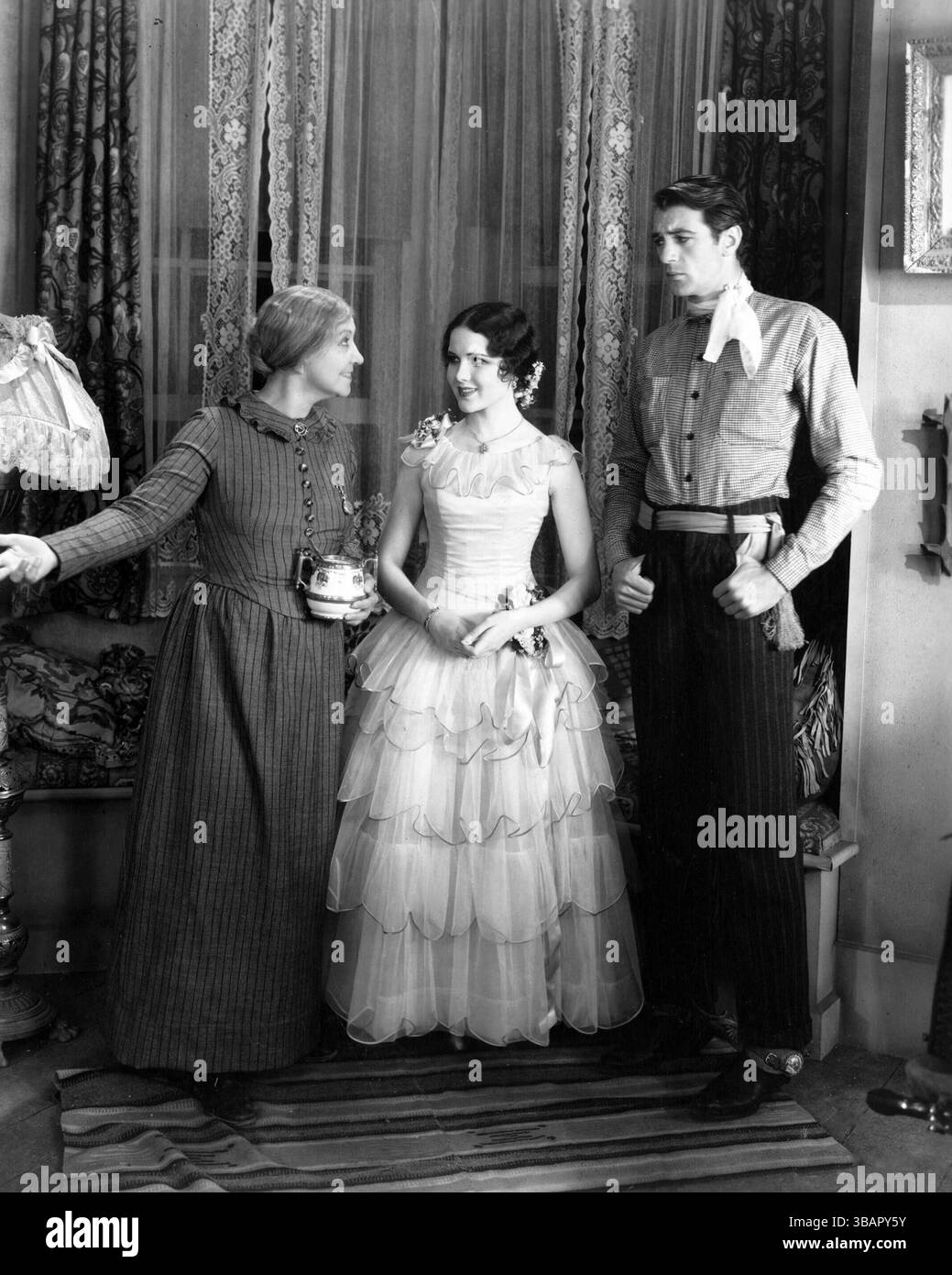 Gary Cooper e Mary Brian in The Virginian (Paramount, 1929) un film WESTERN pre-code Foto Stock