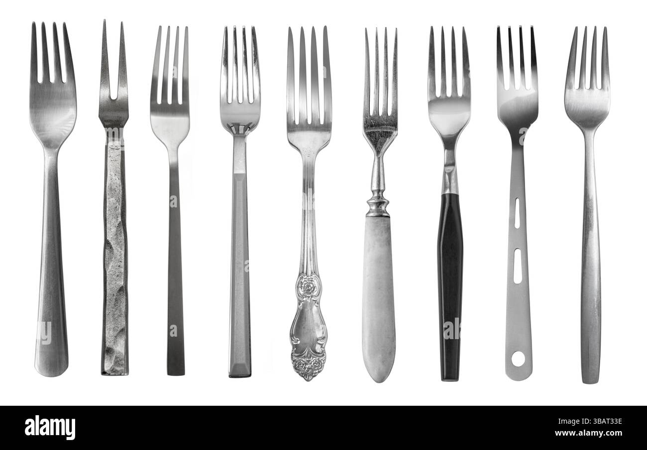 Le forcelle di diversi stili e materiali sono allineate su uno sfondo bianco, per mostrare il loro design unico Foto Stock