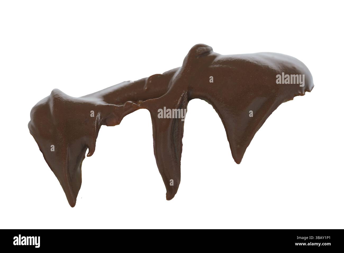 gocciolante di cioccolato, primo piano di gocce di cioccolato, gocce di cioccolato che scorrono dall'alto verso il basso Foto Stock