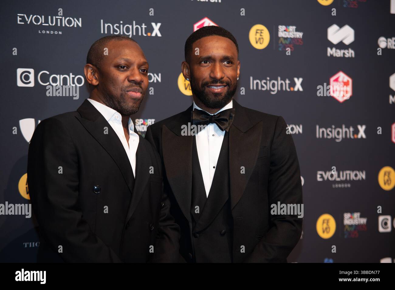 Londra, Inghilterra. 15 maggio 2025. Jermaine Defoe e Shaun Wright-Phillips sul tappeto rosso ai FEVO Sport Industry Awards. Cristina Massei/Alamy Live News Foto Stock