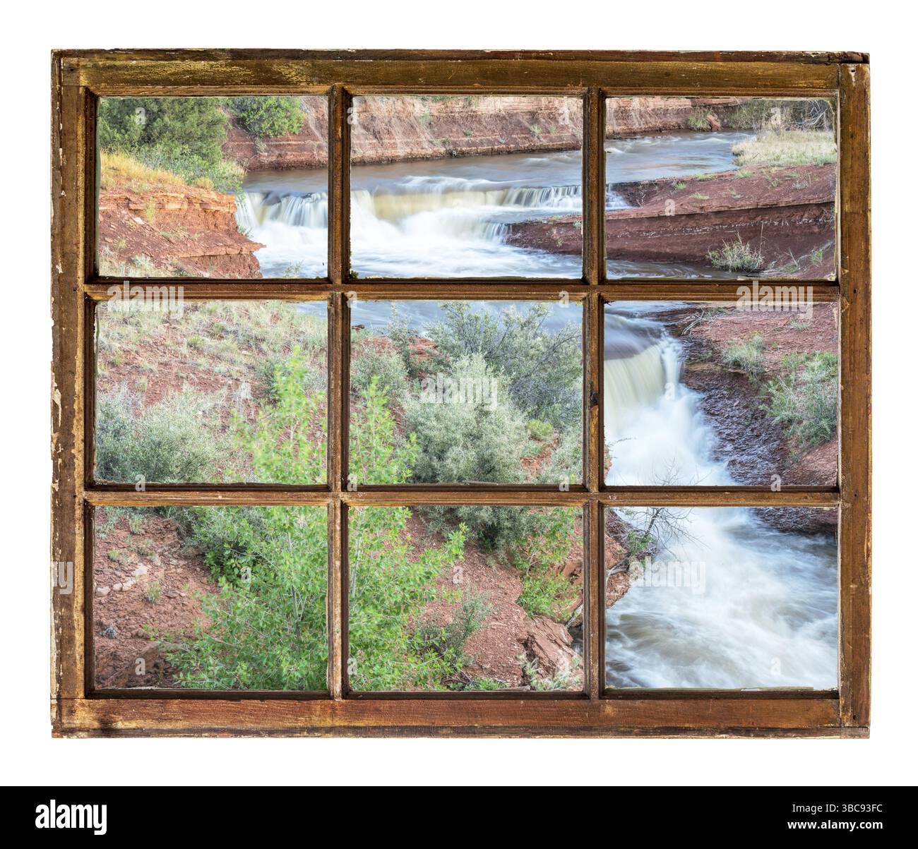 Insenatura con cascate ai piedi delle colline del Colorado settentrionale, vista attraverso una vetrina vintage Foto Stock Insenatura con cascate ai piedi delle colline del Colorado settentrionale, vista attraverso una vetrina vintage Foto Stock