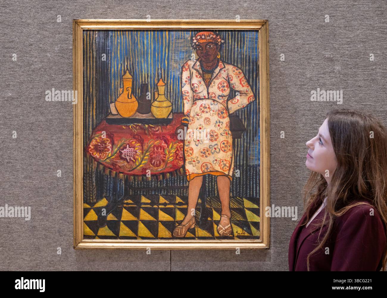 Bonhams, Londra, Regno Unito. 20 maggio 2025. La vendita di arte mediorientale moderna e contemporanea si svolge il 21 maggio. Le attrazioni principali includono: Gazbia Sirry (Egitto, 1925-2021). Una donna con le pentole d'acqua, stimate 170.000-200.000. Crediti: Malcolm Park/Alamy Live News Foto Stock