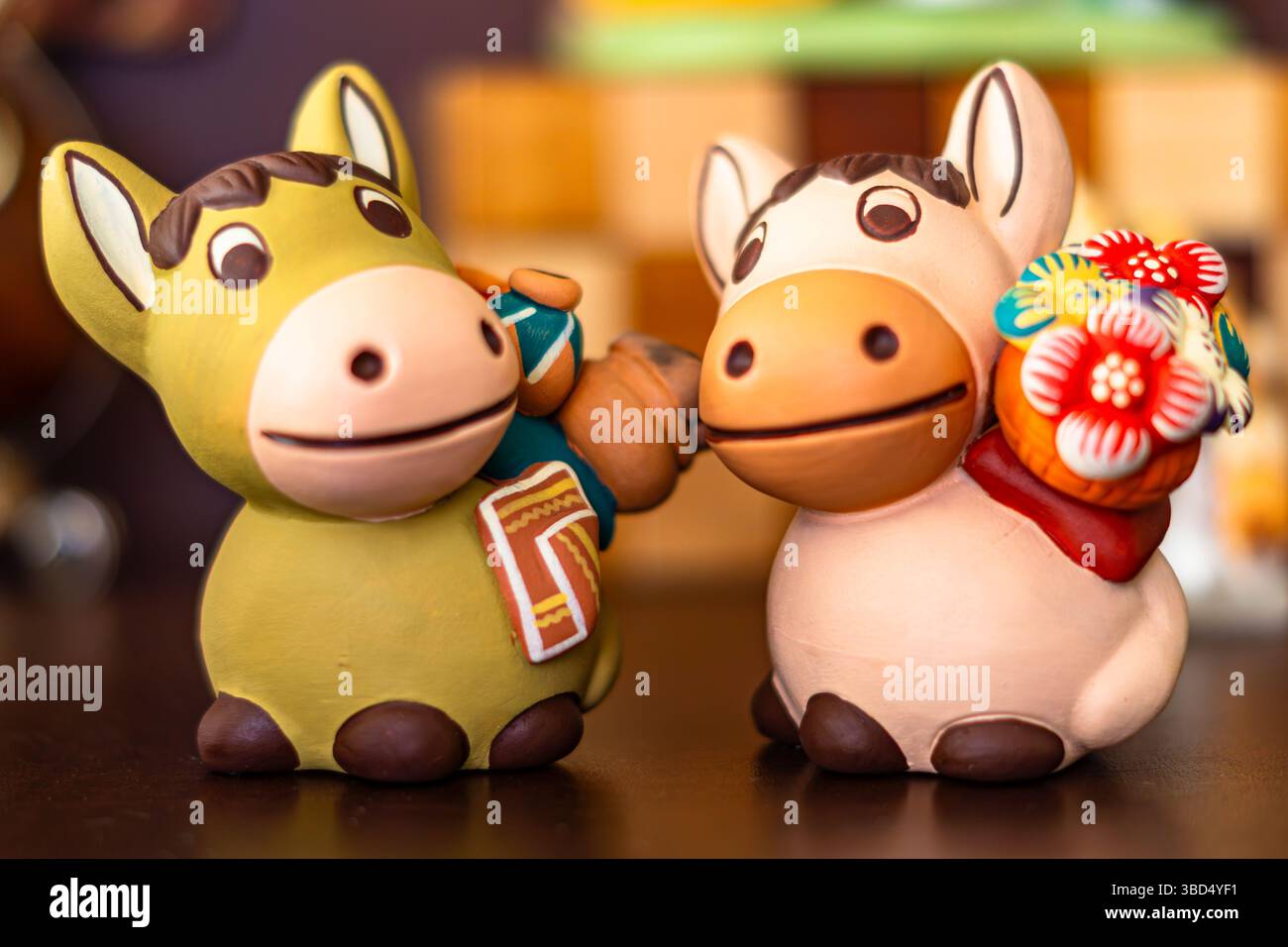 Artigianato peruviano raffigurante due asini di abbondanza e prosperità Foto Stock