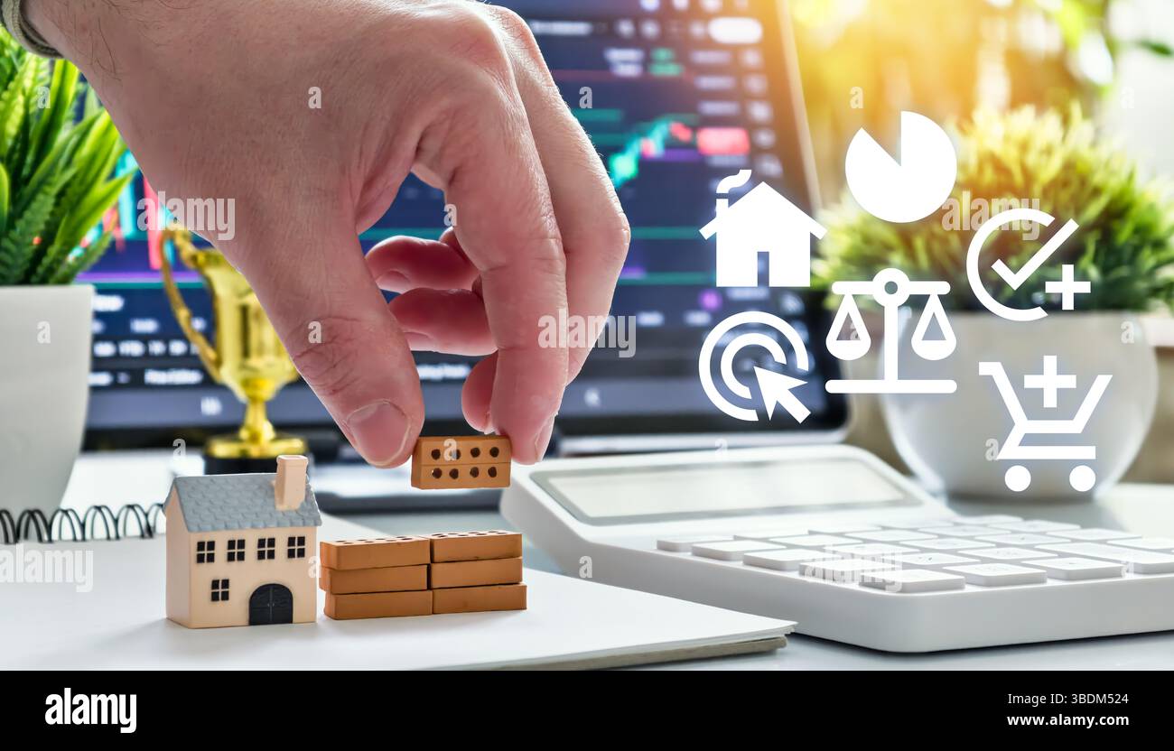 Grafici di pianificazione degli investimenti immobiliari strategici e analisi di mercato in background Foto Stock