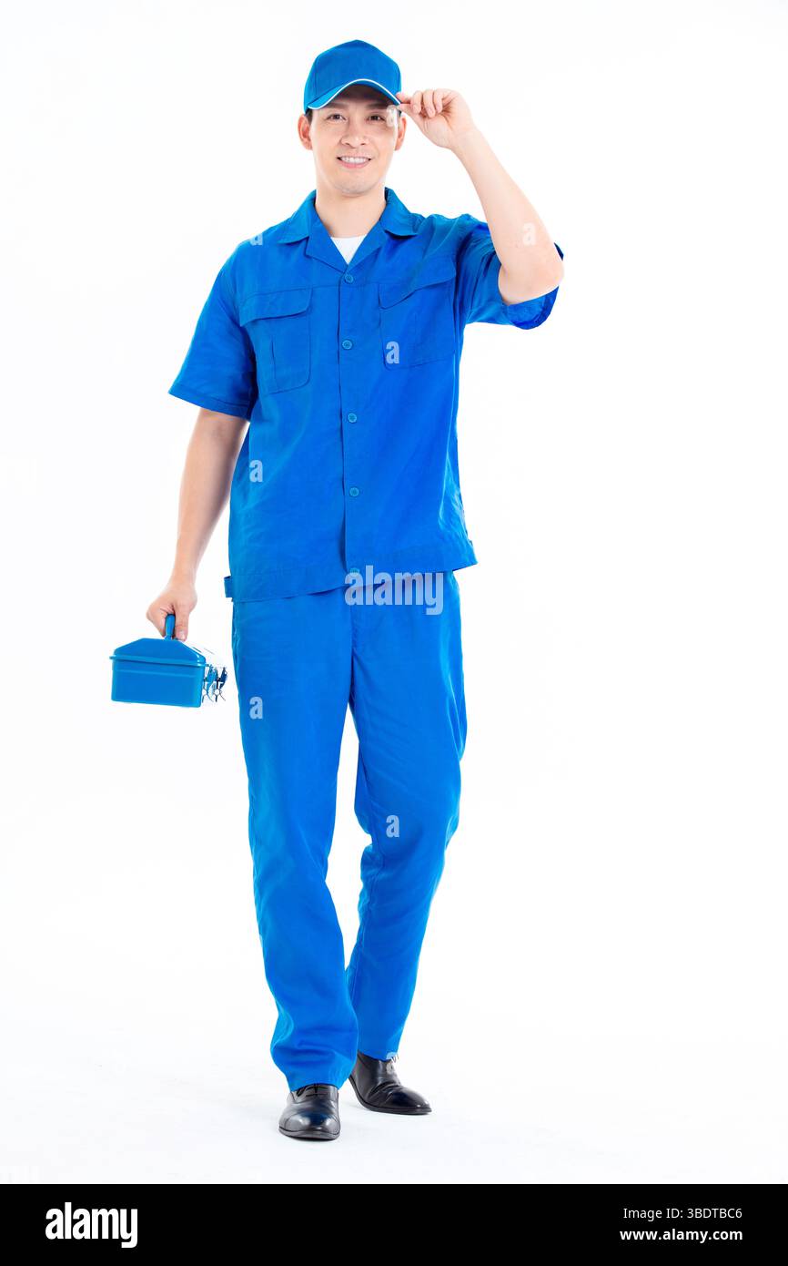 Personale dell'assistenza post-vendita in abbigliamento da lavoro blu Foto Stock