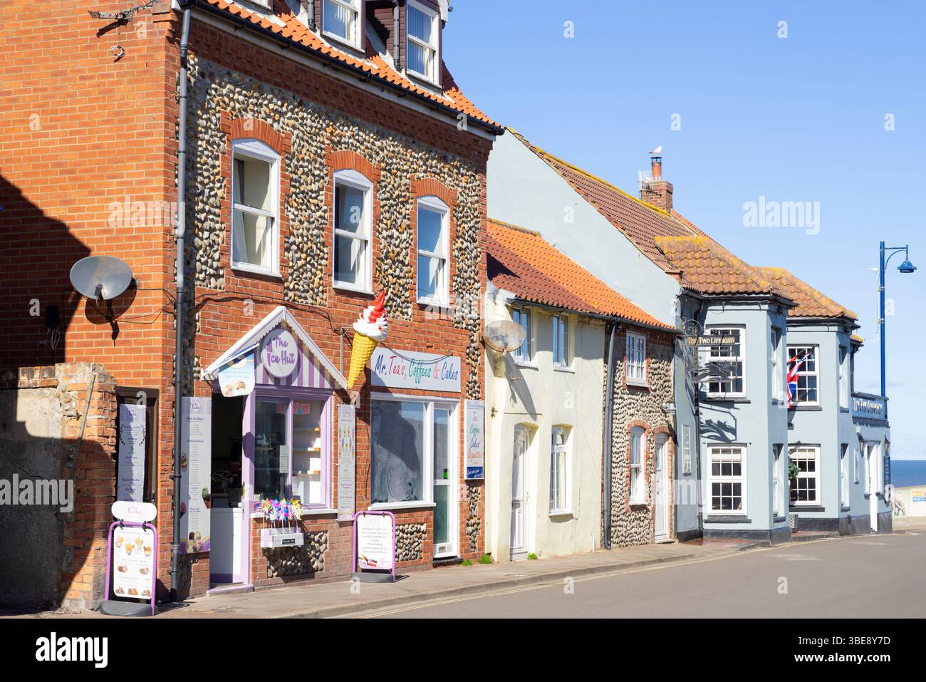 Sheringham Norfolk Sheringham centro città Sheringham High Street Sheringham Norfolk Inghilterra Regno Unito Europa Foto Stock