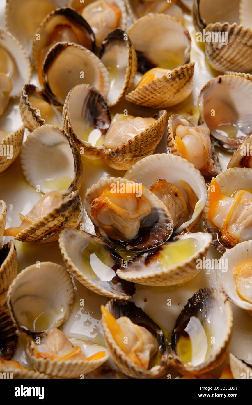 approccio di appetitosi cockles cotti Foto Stock
