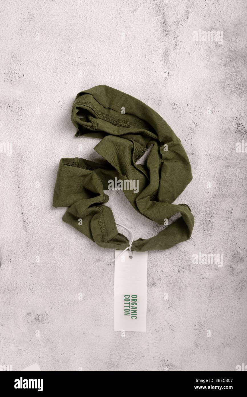 tessuto verde con etichetta in cotone organico Foto Stock
