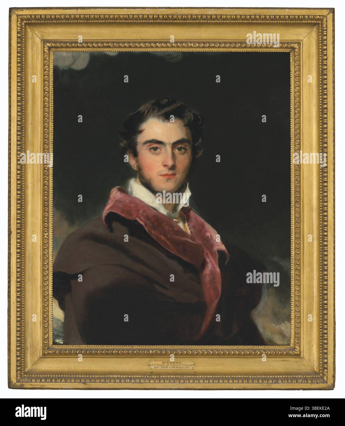 Questo ritratto di Sir Thomas Lawrence (1769-1830) raffigura Richard Meade, III conte di Clanwilliam (1795-1879), con indosso un mantello nero con un collare rosso. L'olio a mezza lunghezza su tela, misura 30 x 25 poll. (76,2 x 63,5 cm), riflette l'abilità di Lawrence nel catturare figure aristocratiche del XIX secolo. Foto Stock