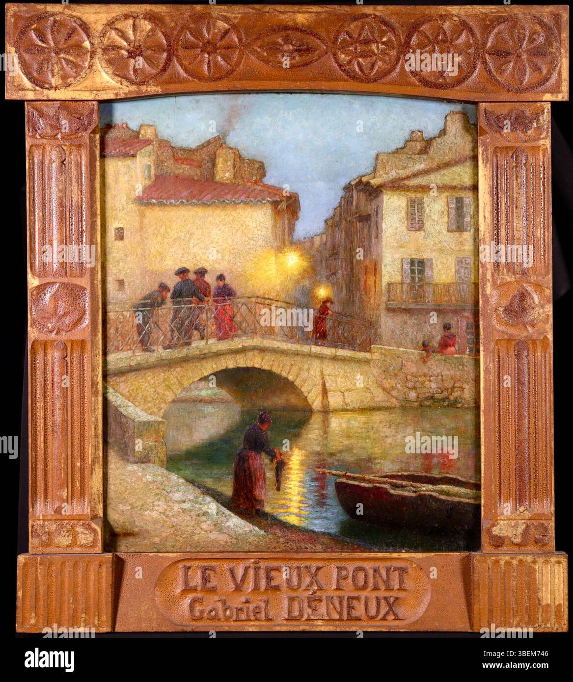 Il dipinto encaustico del 1912 di Gabriel Charles Déneux "le vieux pont, Martigues, effet de Crépuscule" cattura una tranquilla scena del tramonto su un vecchio ponte a Martigues, Francia, incorniciato in una cornice personalizzata dall'artista. Foto Stock