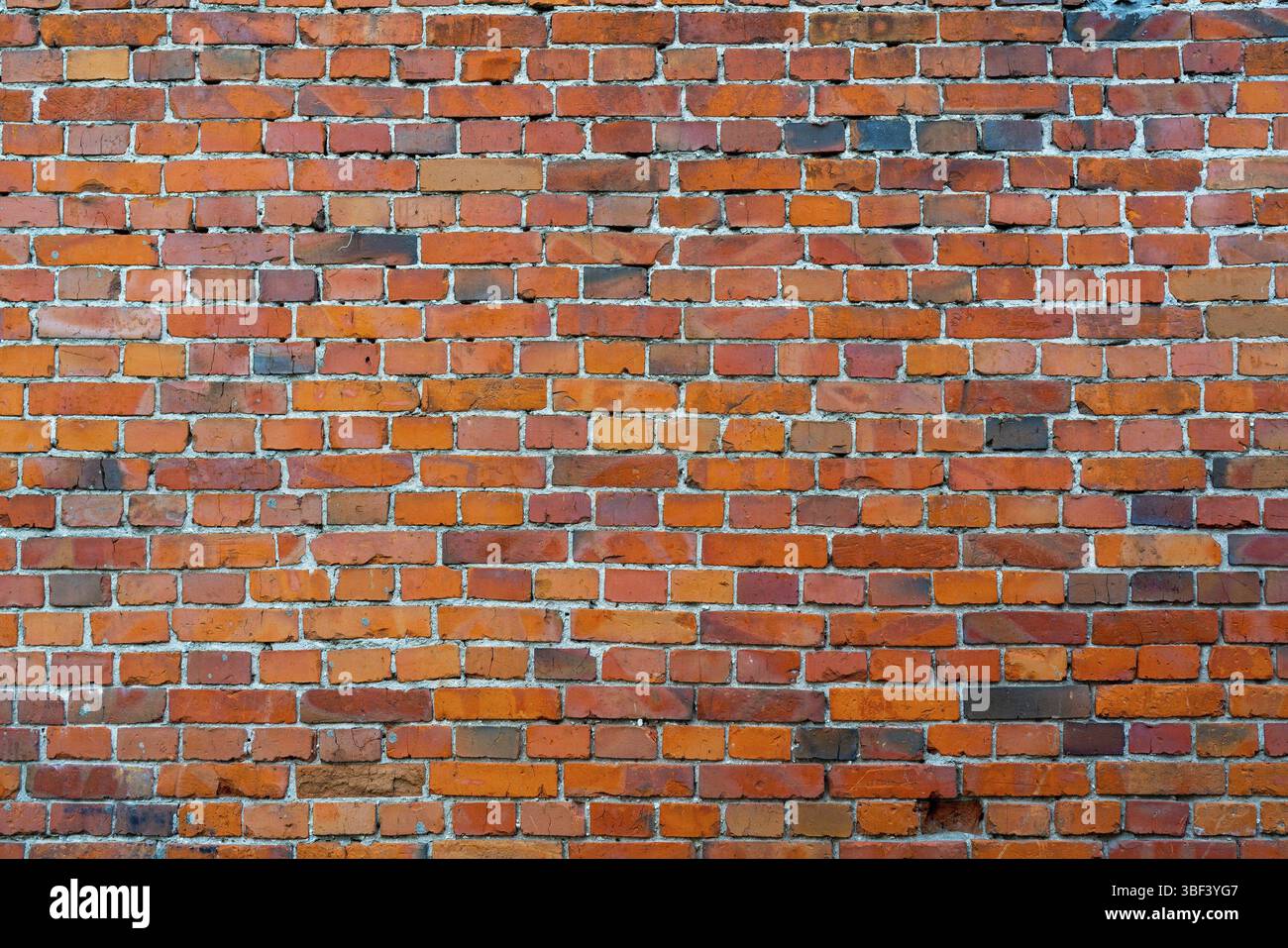 Muro di mattoni rossi. Interno di un moderno loft. Background per la progettazione e la registrazione di colloqui Foto Stock