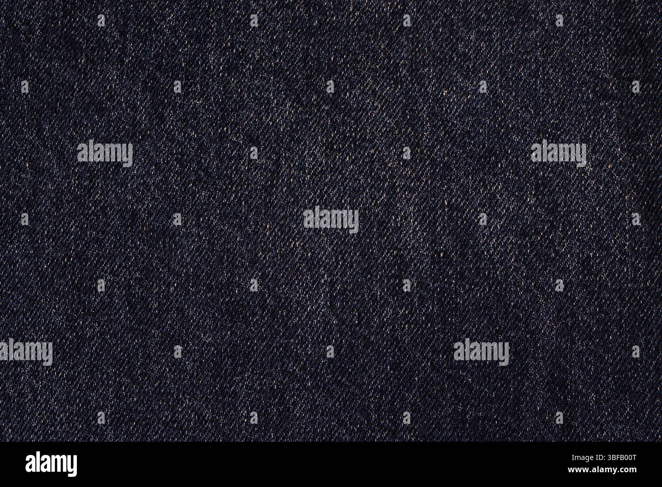 Tessuto denim di colore blu scuro, sfondo a trama Foto Stock