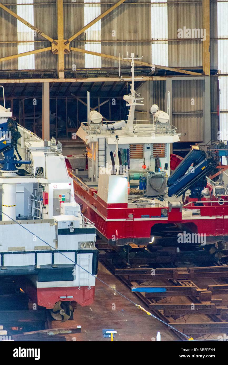 Shiplifts in un hangar marino Foto Stock