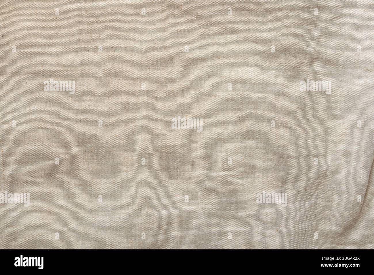 Primo piano in tessuto di lino beige naturale, sfondo per design e creatività Foto Stock