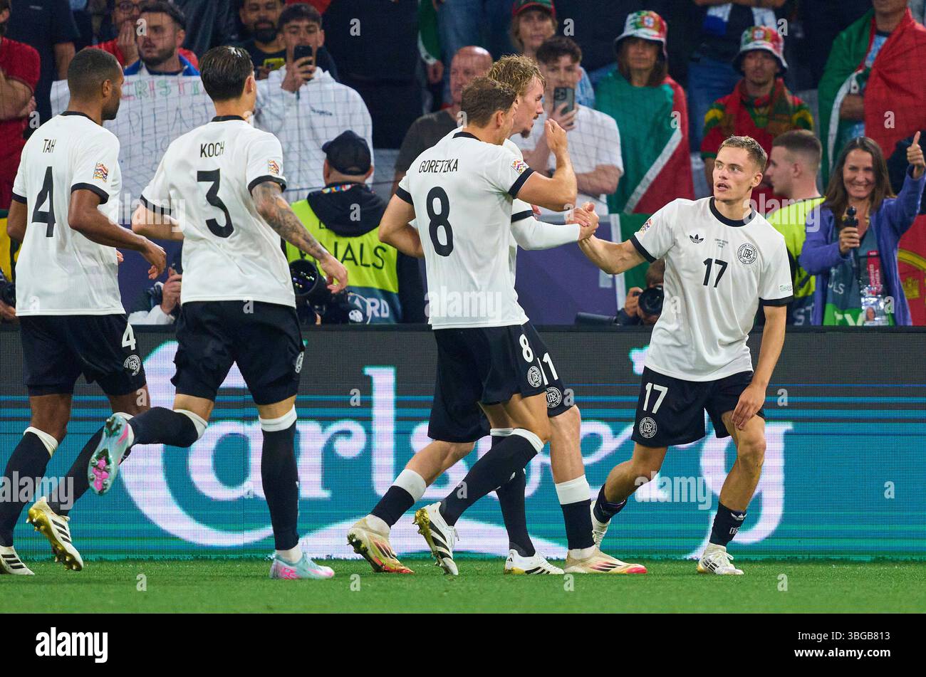 Florian Wirtz, Nr. 17 punti DFB, tiri goal, Tor, Treffer, Torschuss, 1-0, celebra il suo obiettivo, felice, ridere, festeggiare, nella semifinale della UEFA Nations League 2025 GERMANIA - PORTOGALLO nella stagione 2024/2025, il 4 giugno 2025 a Monaco, Germania. Fotografo: ddp Images/STAR-Images credito: ddp media GmbH/Alamy Live News Foto Stock