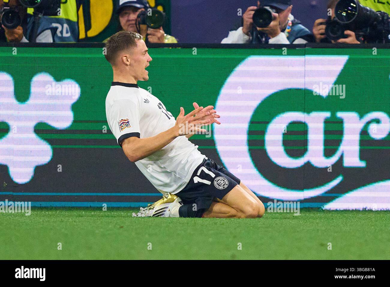 Florian Wirtz, Nr. 17 punti DFB, tiri goal, Tor, Treffer, Torschuss, 1-0, celebra il suo obiettivo, felice, ridere, festeggiare, nella semifinale della UEFA Nations League 2025 GERMANIA - PORTOGALLO nella stagione 2024/2025, il 4 giugno 2025 a Monaco, Germania. Fotografo: ddp Images/STAR-Images credito: ddp media GmbH/Alamy Live News Foto Stock