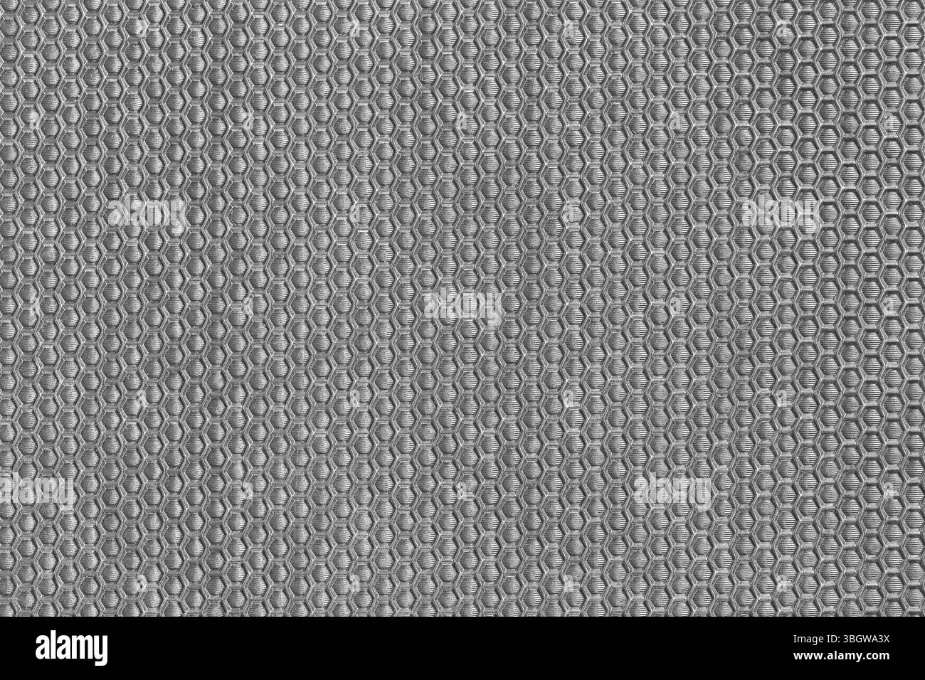 Questo sfondo in plastica grigia testurizzata presenta un design elegante ed elegante, perfetto per vari progetti creativi, dalla moda agli interni in dicembre Foto Stock