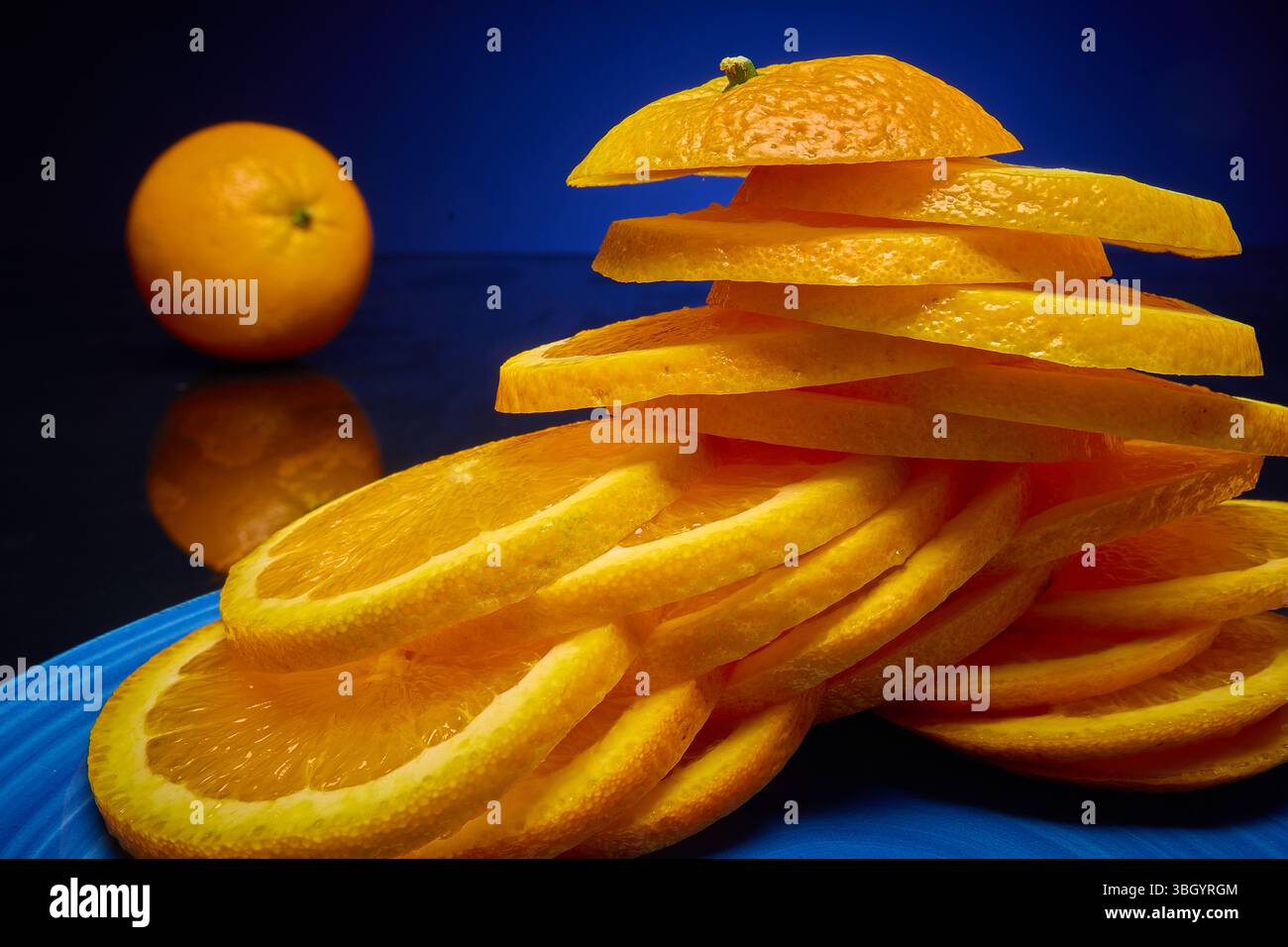Una pila di fette arancioni Foto Stock