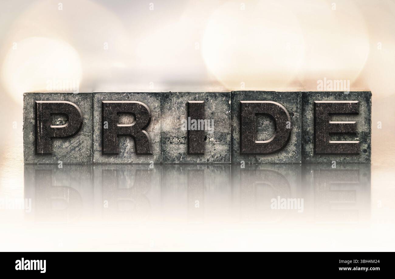 La parola PRIDE scritta in stile letterpress macchiato d'inchiostro vintage Foto Stock