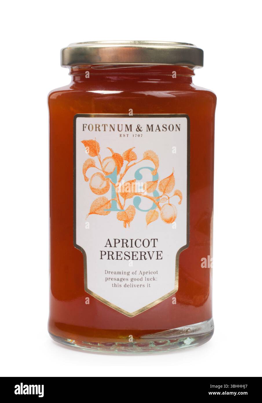 Foto in studio di Fortnum e Mason albicocche Preserve tagliate su sfondo bianco - John Gollop Foto Stock