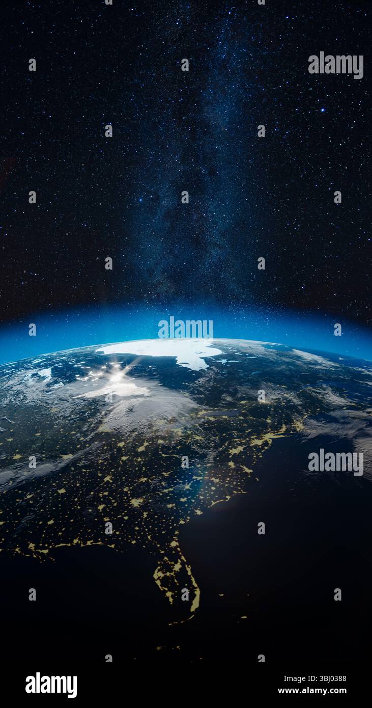 Questa splendida vista mostra la Terra illuminata dalle luci della città sotto una coperta di stelle, rivelando un panorama cosmico di notte Foto Stock