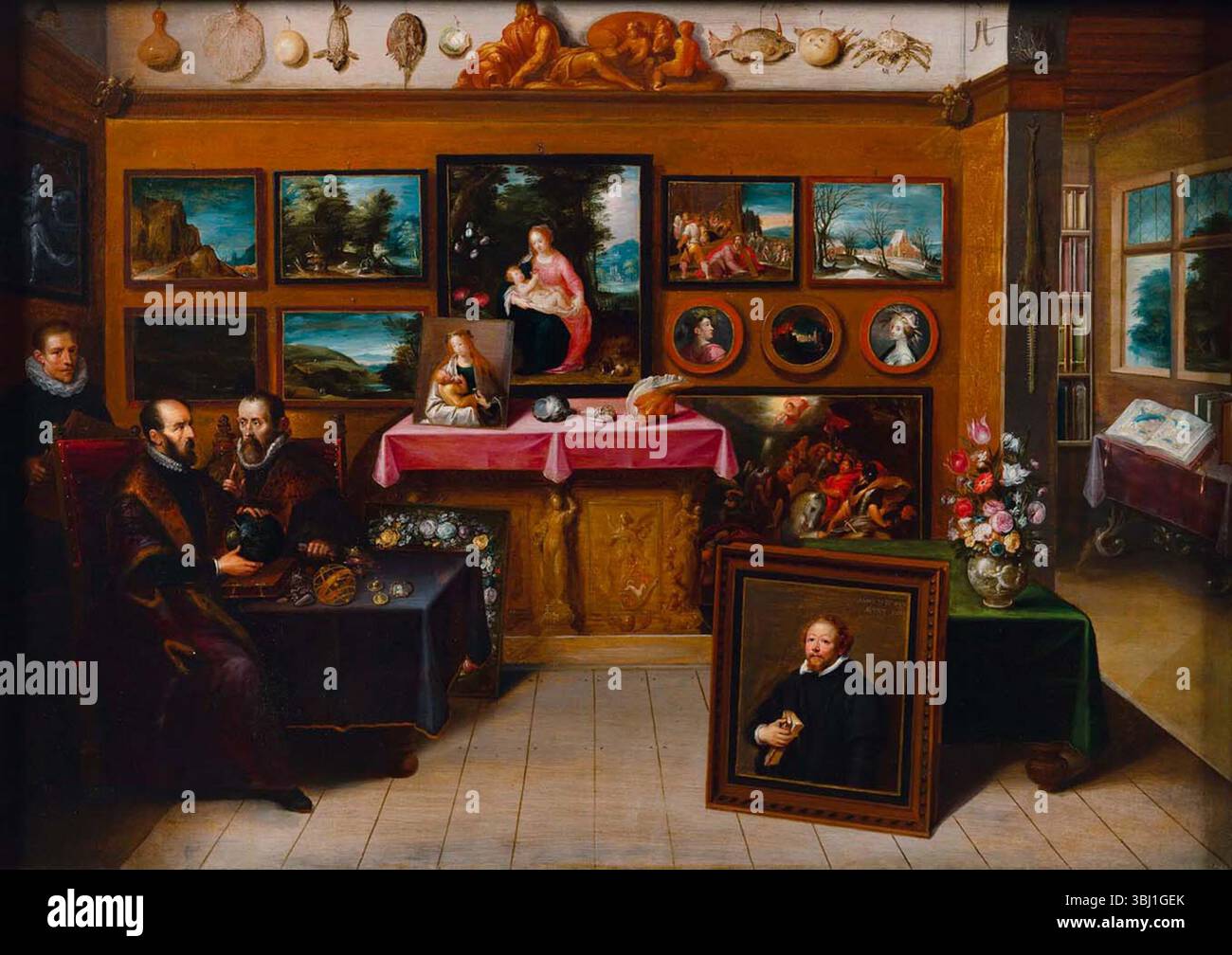 Frans Francken II, un gabinetto d'arte con Abraham Ortelius e Justus Lipsius, 1617. Datato e inciso sul ritratto maschile a destra: Anno 1617/Aetatis 37 olio su tela, trasferito dal pannello 52,5 x 73,5 cm Foto Stock