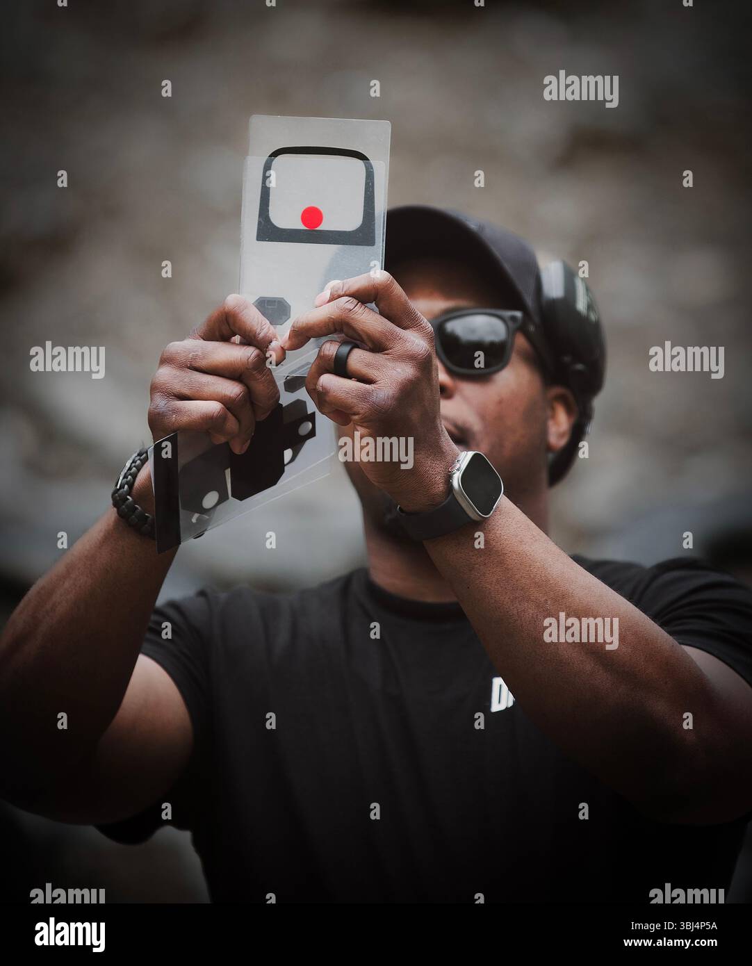 Un uomo che ha un bersaglio Foto Stock