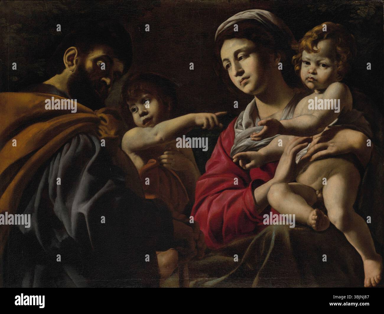 Battistello Caracciolo (–1635) dipinse "la Sacra famiglia con il bambino San Giovanni Battista", un olio su tela. Questa scena religiosa raffigura la Vergine Maria e il bambino Cristo, con il bambino bambino San Giovanni, che ritrae in armonia un momento della Sacra famiglia. Foto Stock