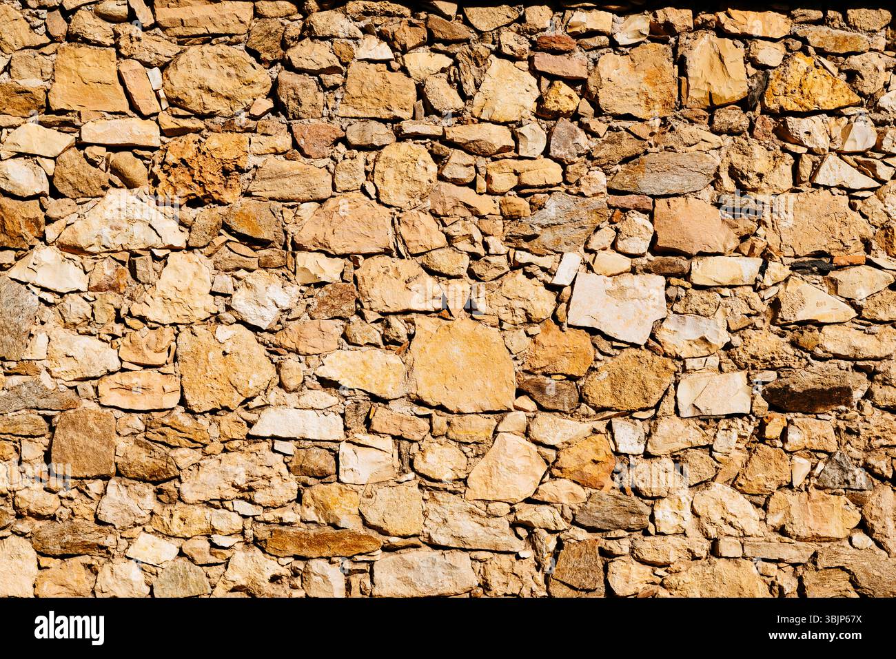 Vecchio muro di pietra. Pedraza, Segovia, Castilla y León, Spagna, Europa Foto Stock