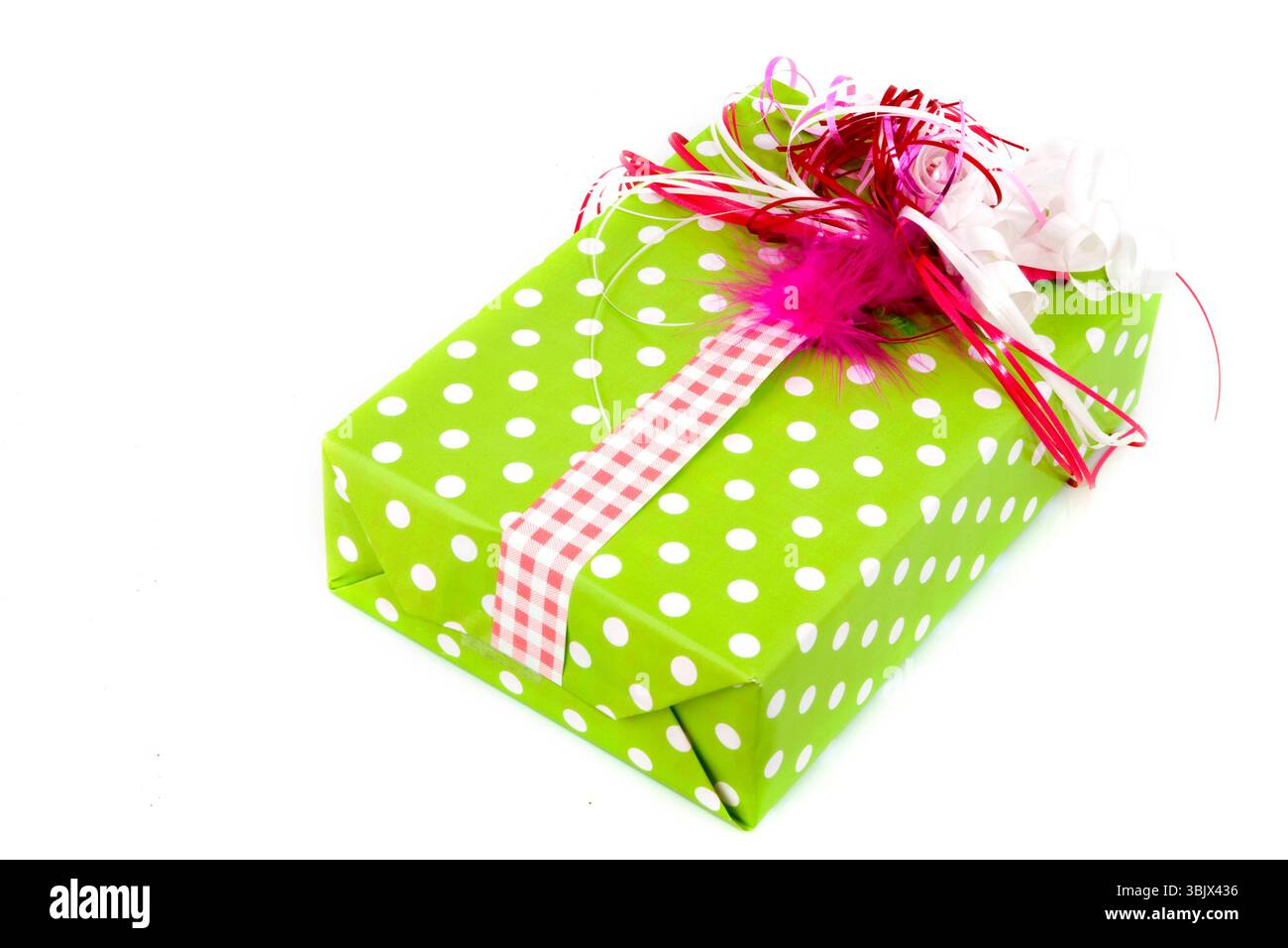 Regalo creativo avvolto in verde Foto Stock