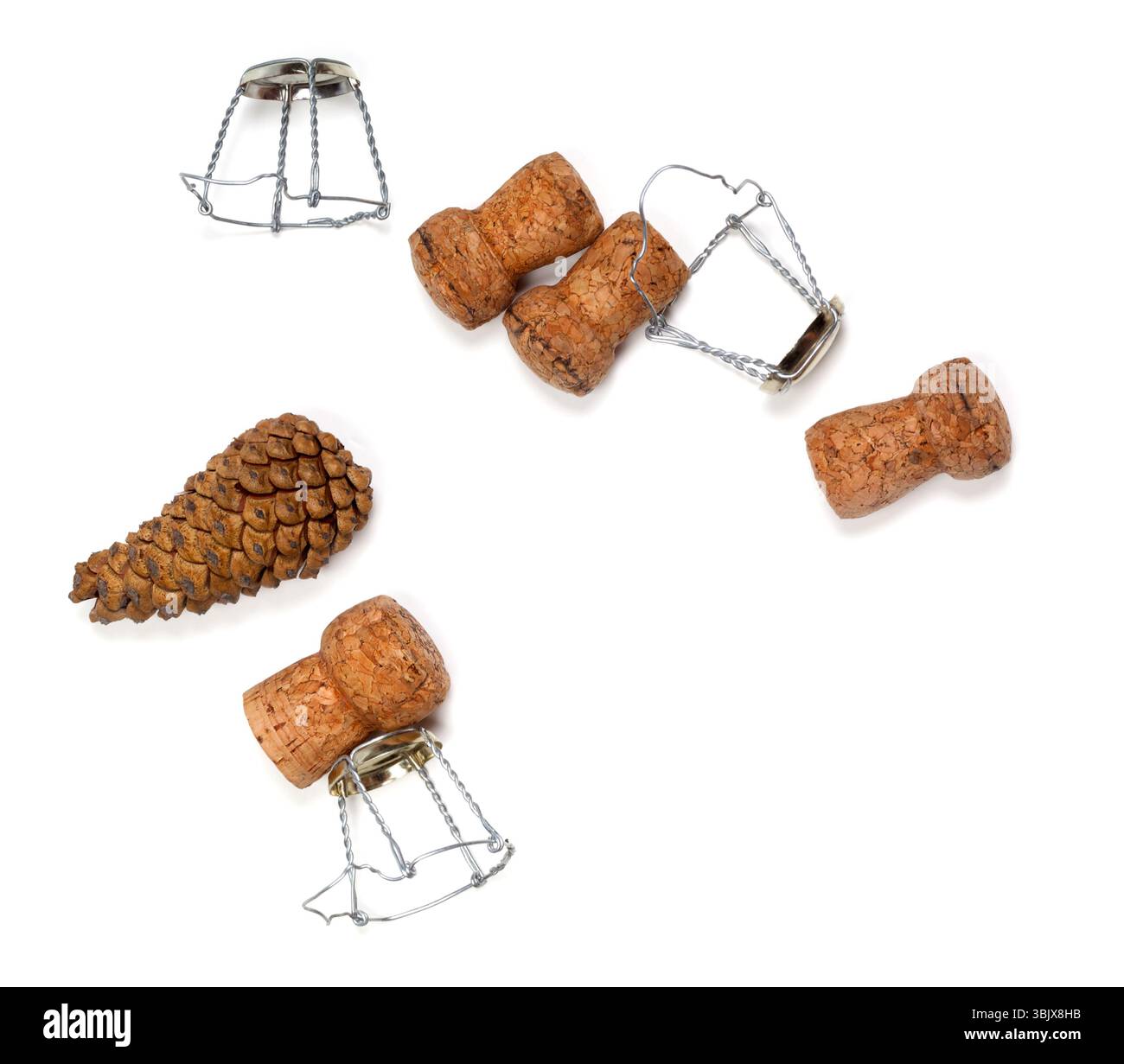 Coni di abete e tappi di champagne con muselet Foto Stock
