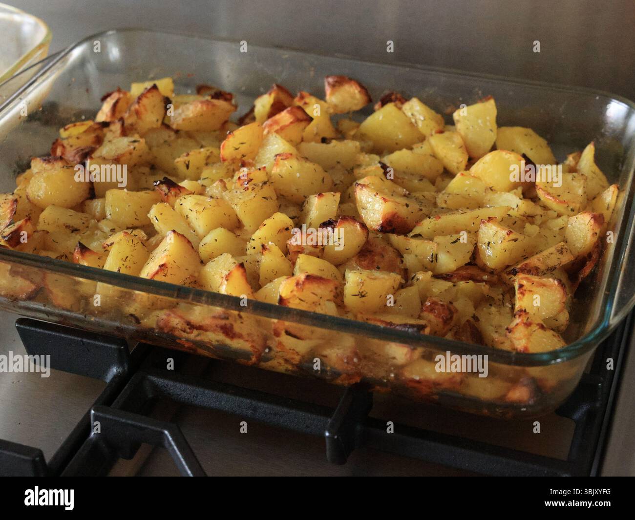 patate arrosto con carne Foto Stock