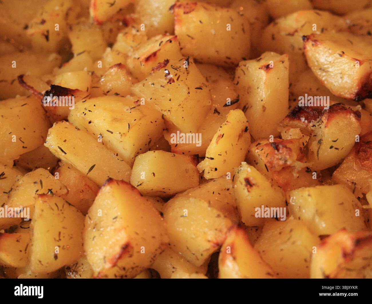 patate arrosto con carne Foto Stock