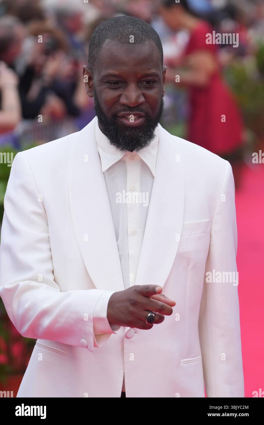 Cabourg, Francia. 14 luglio 2025. Abd al Malik assiste ˆ la crmonie de cl™ture tapis rouge lors du 39 me Festival du film de Cabourg le 14 juin 2025 ˆ Cabourg, Francia. le 14 luglio 2025. Foto par Laurent Lairys /ABACAPRESS.COM Foto Stock