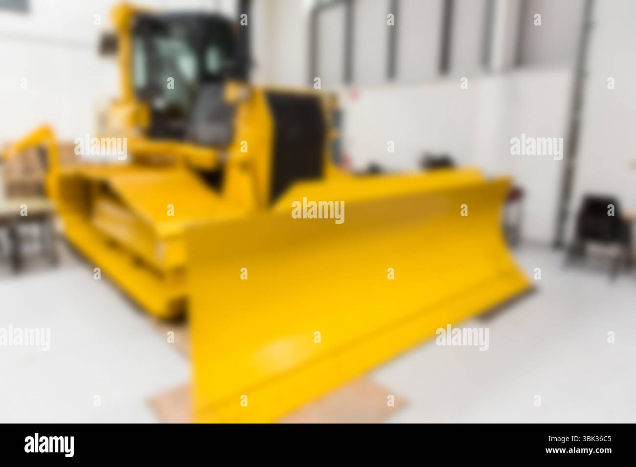 Immagine sfocata del motore giallo della terra Foto Stock