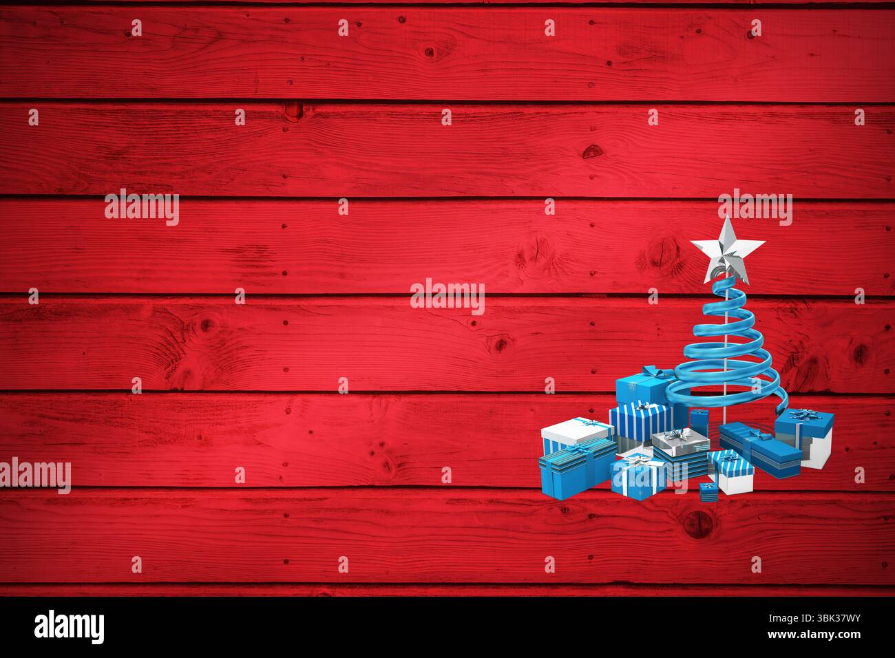 Mostra un albero di Natale blu a spirale con stella d'argento e regali blu-bianco su tavole rosse Foto Stock