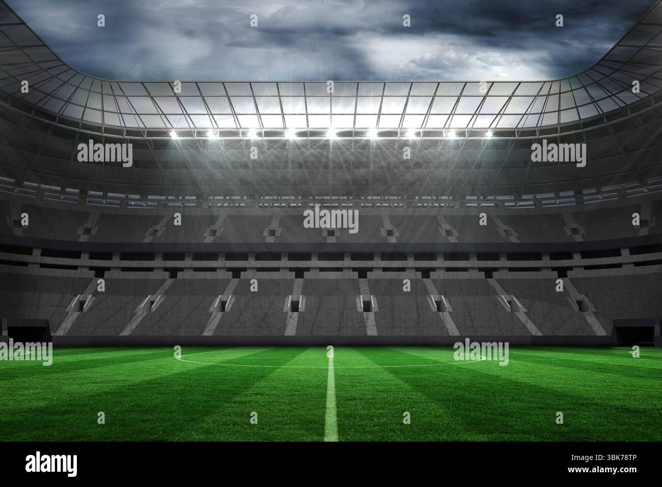 Grandi vuoti allo stadio di calcio con luci Foto Stock