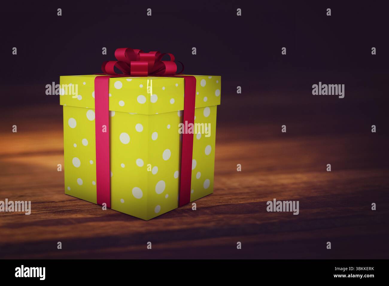 La confezione regalo gialla punteggiata di polka poggia su una superficie in legno con un arco a nastro rosso dal design piatto Foto Stock