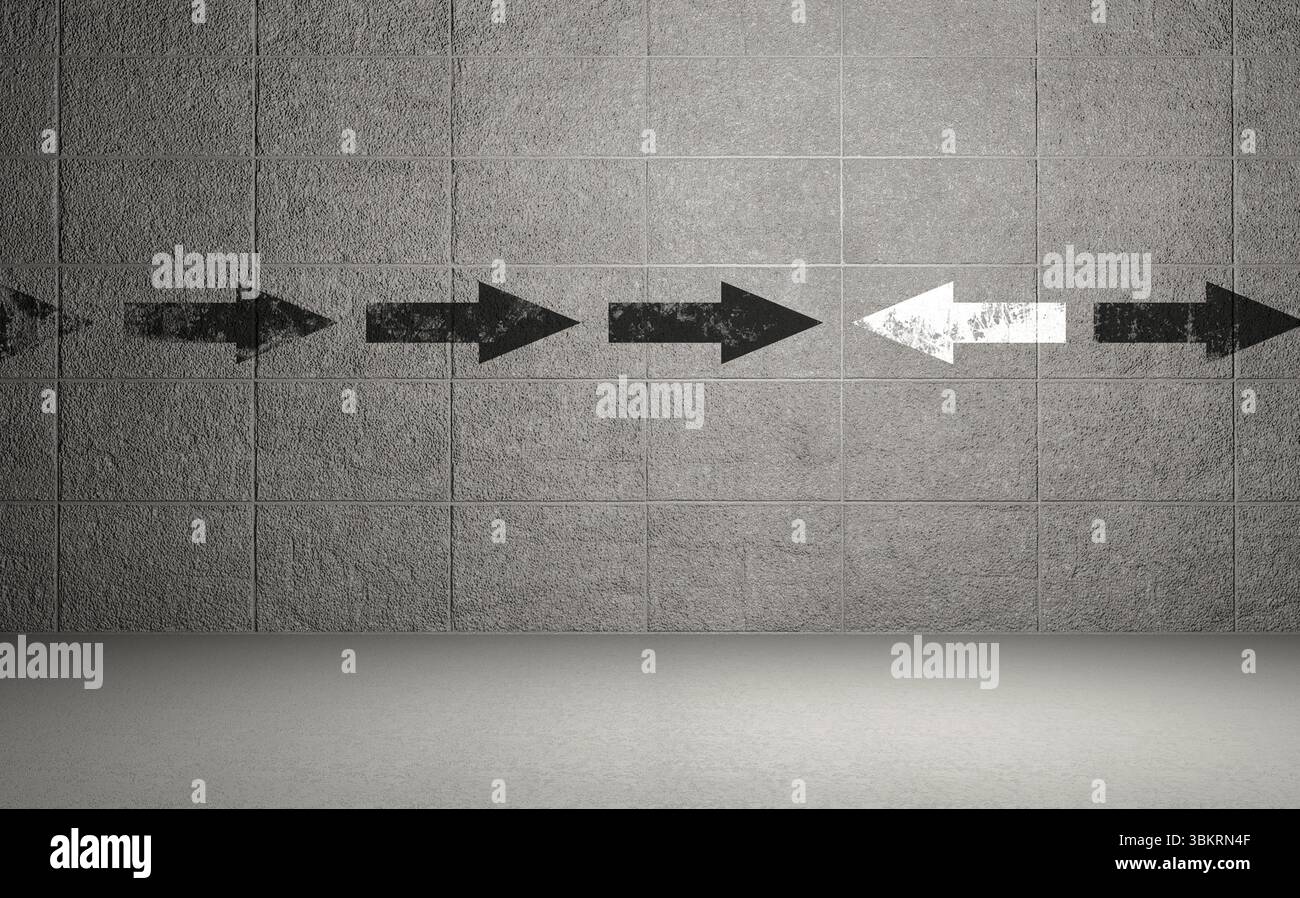 Simbolo delle frecce sulla parete con motivo a segno Foto Stock