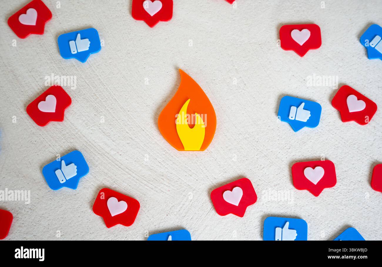 Figurine di fiamma di tendenza tra i piace ai social media. Eventi virali, memi e notizie. Tendenze digitali o polemiche online. Contenuto che diventa virale, attenzione e. Foto Stock