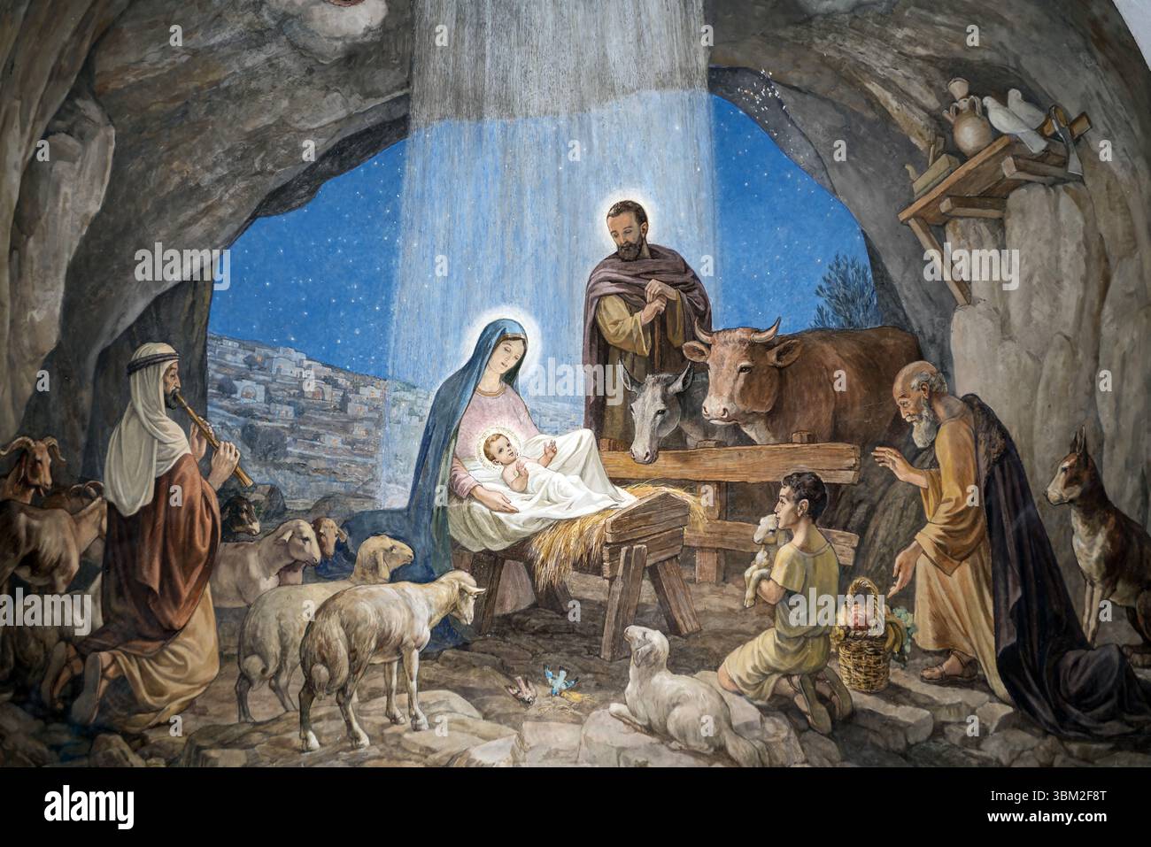 Betlemme, Palestina; dipinto natalizio sull'affresco murale, Weihnachtsbild an der Wand, Fresko, Cuadro navideño en la pared, affresco, Boże Narodzenie Foto Stock