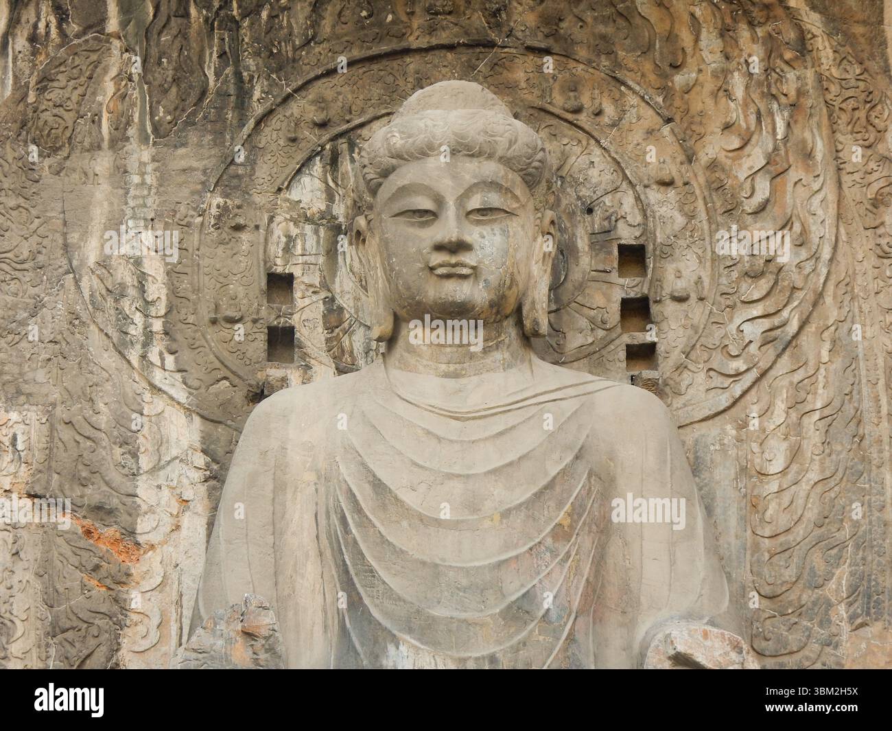 Statua del Buddha alle Grotte di Longmen nella provincia di Henan Foto Stock