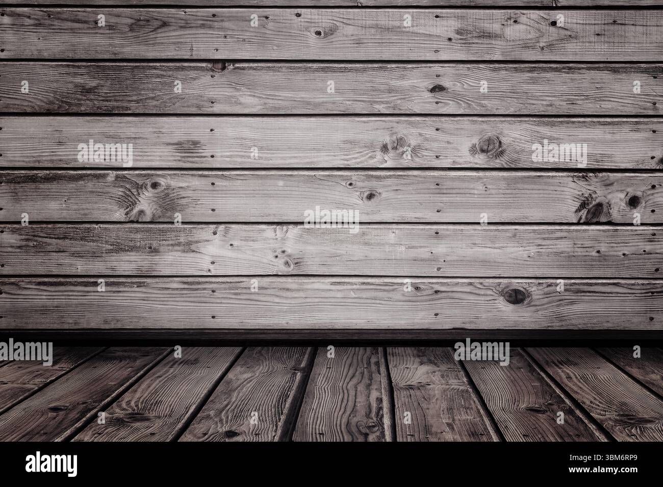 Il pavimento in legno rustico e le tavole delle pareti in stile angosciato convergono in design piatto, spazio di copia Foto Stock