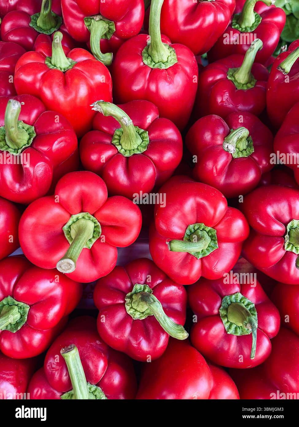 Immagine di sfondo dei peperoni rossi. Foto Stock