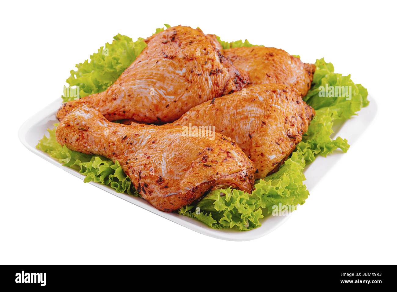 Alimento natura morta, cosce di pollo marinate crude sul piatto Foto Stock